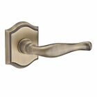 9br3510-005 Baldwin Decorative Double Dummy Door Lever With Traditional Arch Rose