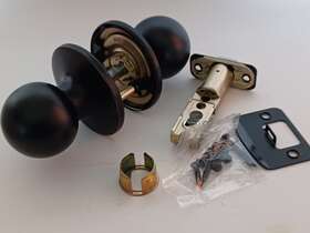 32t3x730b Defiant Saturn Passage Knob Aged Bronze