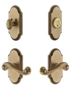 834496 Grandeur Arc Short Plate Entry Set With Newport Lever In Vintage Brass - 2 3/8 Inch