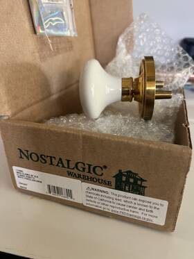 716855 Nostalgic Warehouse Door Knob Classic White Porcelain W Polished Brass