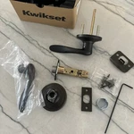 Kwikset Tustin Passage Door Leverset - Venetian Bronze Open Box. Fixed Price $20.00.