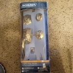 Schlage Camelot Outside Georgian Knob Entry Door + Dead Bolt Lock Set - Satin. Fixed Price $60.00.