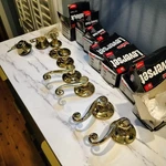Lot Of 7 Kwikset Door Hardware New Deadbolt, Leversets, Dummy Knobs Brass. Fixed Price $82.99.