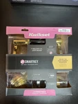 Kwikset Smartkey Combo Pack New Entry Lever 991LL 3 Smt Cp Brass Deadbolt Lock. Fixed Price $29.00.
