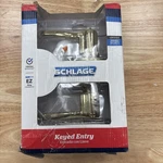Schlage Flair Bright Brass Classic Keyed Entry Door Handle. Fixed Price $35.00.