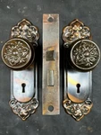 1914 Lockwood Oxford / Saxon Door Knob And Back Plate Passage Set G-11300. Fixed Price $145.00.