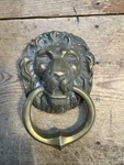 Solid Brass Lion Head Door Knocker. Fixed Price $49.99.