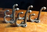 #16 Victorian Cast Iron (5) Figural Acorn Knob Double Hooks. Fixed Price $47.96.