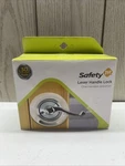 1ST Lever Handle Lock, Child Safety, No Drilling Off-white/cream Color. Fixed Price $15.00.