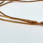 Tiny Copper Cylinders 58INCH Matter Collection. Fixed Price $24.00.