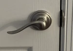Kwikset Tustin Interior Passage Door Lever Reversible Non-locking Satin Nickel. Fixed Price $12.00.