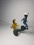 Tin Folkart Action Figure's Run For Your Life! Push Pull Toy, 1980'S ,90'S. Fixed Price $105.00.
