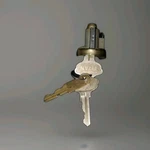 Builders Kwikset Titan Lock Cylinder With 2 Bronze Color Keys Change Tool. Fixed Price $19.99.