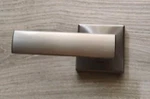 Kwikset Vedani Half-dummy Lever Satin Nickel 97880-814. Fixed Price $12.00.
