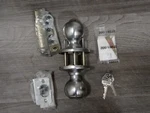 Kwikset Polo Keyed Entry Knob Featuring Smartkey Satin Chrome Model 94009-230. Fixed Price $60.00.