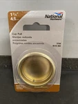 National Hardware N115-964 Recessed Round Cup Pull 1-3/4" Bright Brass Finish. Fixed Price $8.09.