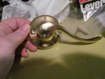 Kwikset Leverset Polished Brass Left-handed Dummy Door Handle Saxton 488SNL Nos. Fixed Price $8.50.