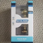 Four (4) Schlage F40 Ply 605 - Bright Brass Privacy Bed Bath Door Knobs. Fixed Price $78.85.
