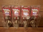 Of 4 Kwikset Security Inactive Universal Side Bronze Door Lever Non Latching. Fixed Price $19.95.
