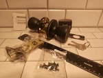 Design House 728709 Terrace 6-WAY Universal Latch Entry Door Knob, Oil Rubbed Fs. Fixed Price $19.99.