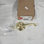 New Box Schlage F170 Fla 605 Rh Non-turning Dummy Handle, Brass One Sided. Fixed Price $15.00.